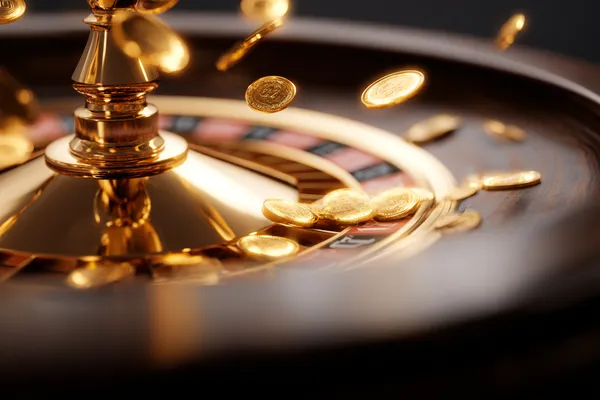 786BET Mobile App — Your complete hub for casino and sports A man focused on his laptop with live stats in the background, highlighting the dedicated sports and gaming features of the 786BET mobile app.